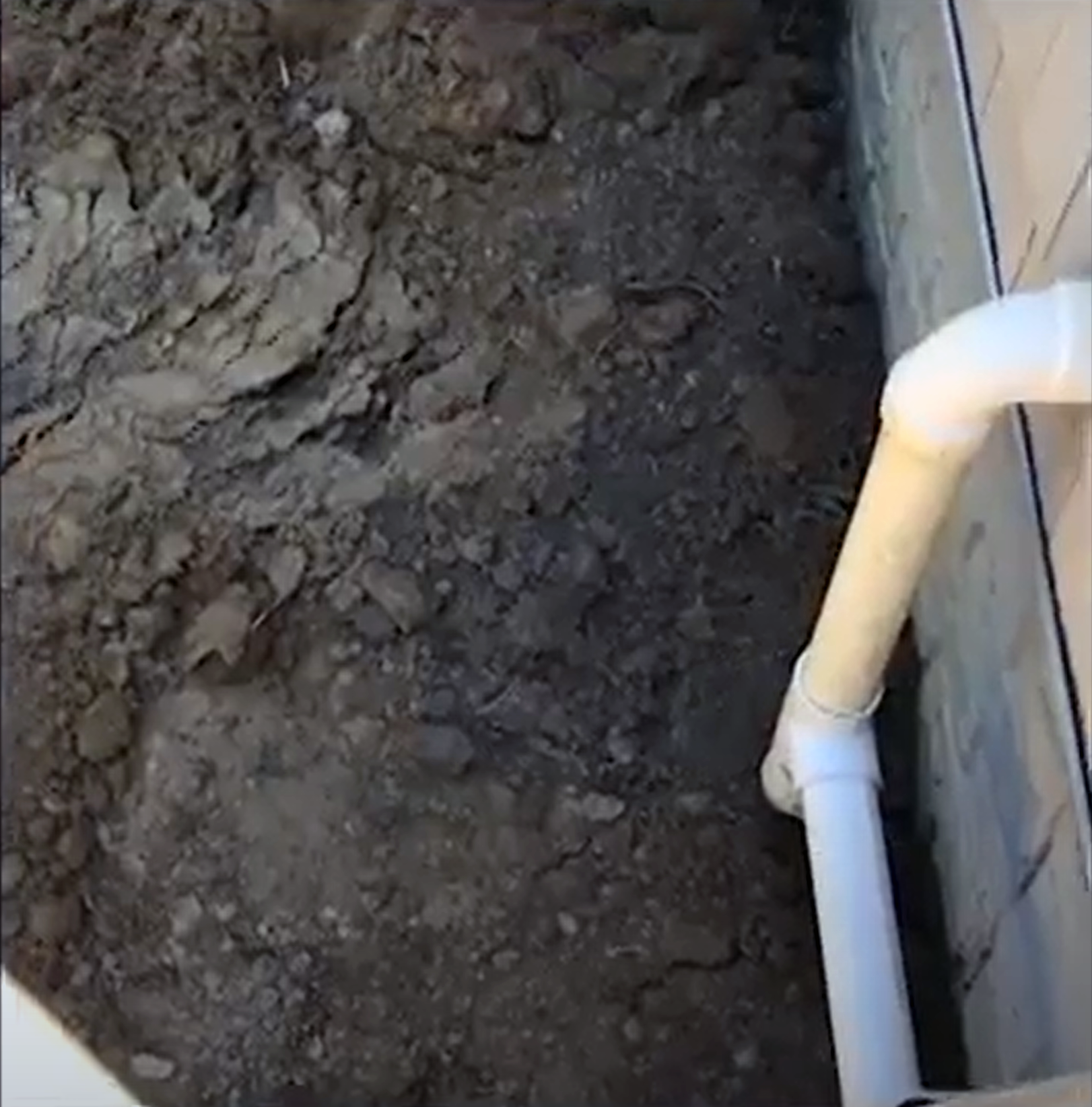 Geothermal Pipes Connecting To Side of House